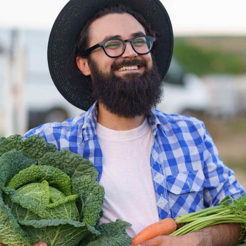 the-farmer-with-vegetables-autumn-harvest-A52MLXB.jpg