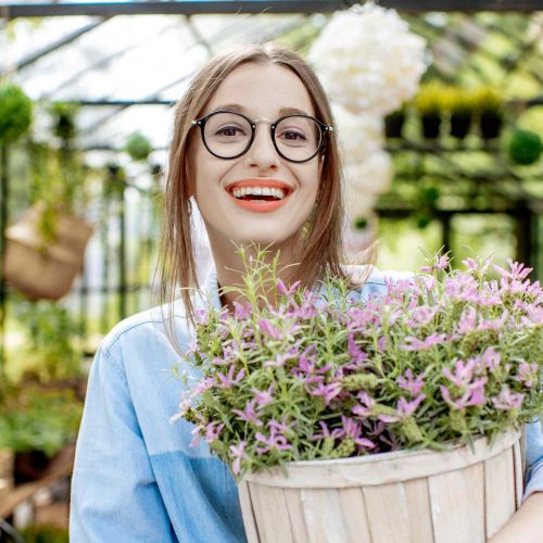 woman-with-lavender-in-the-greenhouse-6E6RDA7.jpg